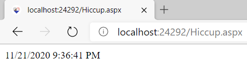 Screenshot of the overwritten Hiccup.aspx page being accessed in a browser displaying the current date and time